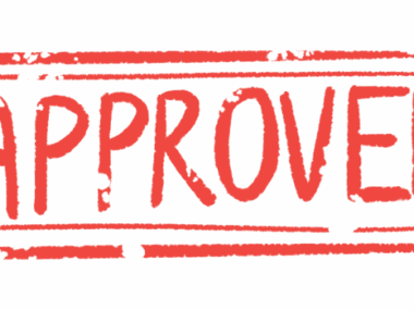 A rubber stamp shows the word APPROVED in red.