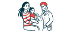 A girl sits on her mother's lap as a doctor examines her with his stethoscope.