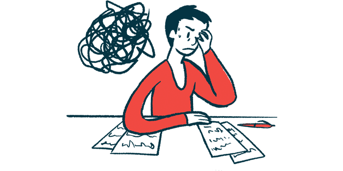 A person shows signs of frustration and stress while looking at some documents.